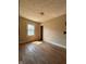 Bedroom with wood floors, a window, and natural light at 3646 Creston Dr, Indianapolis, IN 46222