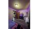 Bedroom with dark wood floors, closet and makeup vanity at 3646 Creston Dr, Indianapolis, IN 46222