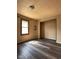 Bedroom with wood floors, a closet, and natural light at 3646 Creston Dr, Indianapolis, IN 46222