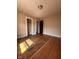 Spacious bedroom with hardwood floors, closet, and natural light at 3646 Creston Dr, Indianapolis, IN 46222