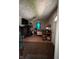 Living room with wood floors and furniture and television at 3646 Creston Dr, Indianapolis, IN 46222