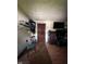 Messy room with wood floor at 3646 Creston Dr, Indianapolis, IN 46222