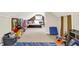 Spacious attic with carpet, natural lighting, and versatile play and storage areas at 3918 N Park Ave, Indianapolis, IN 46205