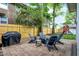 Cozy backyard patio with brick pavers, a grill, and outdoor seating to enjoy the lovely weather at 3918 N Park Ave, Indianapolis, IN 46205