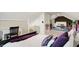 Bright attic bedroom featuring bed, desk, and storage, with a view into the play area at 3918 N Park Ave, Indianapolis, IN 46205