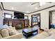 Inviting living room with hardwood floors, fireplace, and modern lighting fixtures at 3918 N Park Ave, Indianapolis, IN 46205