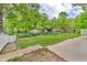 Waterfront view with trees and grass at 4154 W Briarwood Lake S Dr, Monrovia, IN 46157