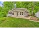 Single-story home with neutral siding and green landscaping at 4154 W Briarwood Lake S Dr, Monrovia, IN 46157
