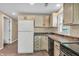 Kitchen with white appliances, neutral cabinets, laminate counters, and stainless steel oven at 4154 W Briarwood Lake S Dr, Monrovia, IN 46157