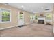 Bright living room with fireplace, multiple windows, and neutral paint at 4154 W Briarwood Lake S Dr, Monrovia, IN 46157