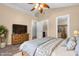 Spacious main bedroom features a ceiling fan, ensuite bath, and large closet at 4154 W Briarwood Lake S Dr, Monrovia, IN 46157