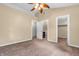 Bright and airy main bedroom with neutral walls, carpet flooring, and ensuite bathroom access at 4154 W Briarwood Lake S Dr, Monrovia, IN 46157