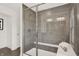 Sleek bathroom featuring a glass enclosed shower, modern fixtures, and a comfortable bench for a spa-like experience at 4159 Persian St, Greenwood, IN 46143