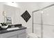 Sleek bathroom with a modern vanity, and a glass-enclosed shower at 4159 Persian St, Greenwood, IN 46143