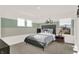 Stylish bedroom with gray bed, neutral walls, and bicycle-themed decor at 4159 Persian St, Greenwood, IN 46143