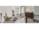 Well-lit Bedroom featuring rocking horses, stuffed elephant, and two chairs at 4159 Persian St, Greenwood, IN 46143