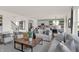 Spacious living room open to kitchen featuring modern décor, hardwood floors, and plenty of natural light at 4159 Persian St, Greenwood, IN 46143
