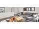 Bright living room with a plush gray sectional, unique wood coffee table, and stylish decor enhancing the modern feel at 4159 Persian St, Greenwood, IN 46143