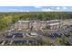 Aerial view of the Holliday Farms building featuring a parking lot and landscaping at 4190 Hartswick Ct, Zionsville, IN 46077