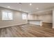 Open basement featuring wood flooring, recessed lighting, and windows at 4190 Hartswick Ct, Zionsville, IN 46077
