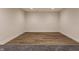 Unfurnished basement featuring recessed lighting and hardwood flooring at 4190 Hartswick Ct, Zionsville, IN 46077