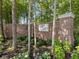 Holliday Farms entrance with brick sign, landscaping, and trees at 4190 Hartswick Ct, Zionsville, IN 46077