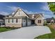 Charming home featuring a 3-car garage, brick and siding exterior, complemented by a well-manicured lawn at 4190 Hartswick Ct, Zionsville, IN 46077