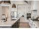 Spacious kitchen features a large island, stainless steel appliances, and a stylish design at 4190 Hartswick Ct, Zionsville, IN 46077