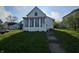 Charming home featuring a quaint front yard and multiple windows at 421 N Canal St, Alexandria, IN 46001