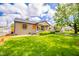 Charming single Gathering home features a landscaped front yard, covered entryway and light colored brick at 433 N 15Th Ave, Beech Grove, IN 46107