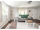 Living room features hardwood floors, neutral colors, and lots of natural light at 433 N 15Th Ave, Beech Grove, IN 46107