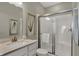 Bright bathroom with a glass enclosed shower, framed art, and modern fixtures at 4372 Persian St, Greenwood, IN 46143