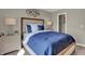 Beautiful bedroom featuring a decorative headboard, stylish nightstands, and accent pillows at 4372 Persian St, Greenwood, IN 46143