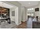 Spacious hallway leading to an office and a living area with high ceilings and large windows at 4372 Persian St, Greenwood, IN 46143