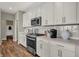Modern kitchen featuring white cabinets, stainless appliances and subway tile backsplash at 4372 Persian St, Greenwood, IN 46143