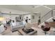 Open floor plan showcases living room, dining area and kitchen with a staircase at 4372 Persian St, Greenwood, IN 46143