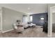 Comfortable living room featuring a plush sofa, stylish decor, and ample natural light at 4372 Persian St, Greenwood, IN 46143