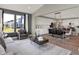 Open concept living space with hardwood floors, ample natural light and neutral decor at 4372 Persian St, Greenwood, IN 46143