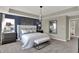 Spacious main bedroom with stylish decor, a comfortable bed, and modern lighting at 4372 Persian St, Greenwood, IN 46143