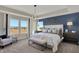 Elegant main bedroom with large windows, decorative lighting, and comfortable seating at 4372 Persian St, Greenwood, IN 46143