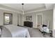 Bright and airy main bedroom with a sleek design, comfortable seating, and ample space at 4372 Persian St, Greenwood, IN 46143