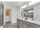 Bright bathroom features a double vanity with modern fixtures and a large mirror at 4400 Persian St, Greenwood, IN 46143