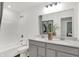 Bathroom featuring a double sink vanity, shower and bath tub provides a luxurious, spa-like experience at 4400 Persian St, Greenwood, IN 46143