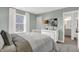 Bedroom with artwork on the walls and natural light exhibits a comfortable and inviting atmosphere at 4400 Persian St, Greenwood, IN 46143