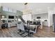Open-concept design featuring a view from the kitchen to the living room with modern decor and abundant light at 4400 Persian St, Greenwood, IN 46143