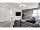 Inviting living room with a flat-screen TV and views into an adjacent bedroom at 4400 Persian St, Greenwood, IN 46143