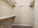 Walk-in closet with shelves and rod for hanging clothes at 455 S Pine St # 4, Indianapolis, IN 46203