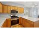 Well-equipped kitchen features wood cabinets, stainless steel appliances, and great lighting at 455 S Pine St # 4, Indianapolis, IN 46203