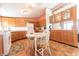 Eat-in kitchen featuring an abundance of wooden cabinets and a charming breakfast nook at 4641 Autumn Ridge Dr, Columbus, IN 47203