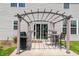 Backyard patio area with pergola, barbecue grill, and table set, great for outdoor dining and entertaining at 4863 Sherlock Dr, Westfield, IN 46062